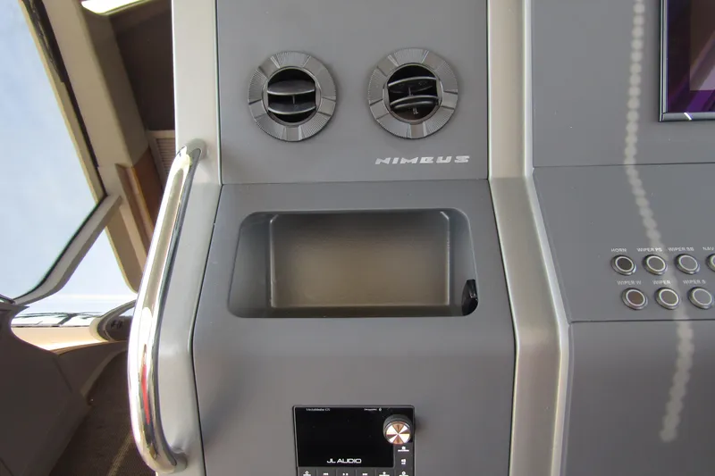  Yacht Photos Pics Dashboard of 2025 Nimbus Commuter 11 with controls and air vents.