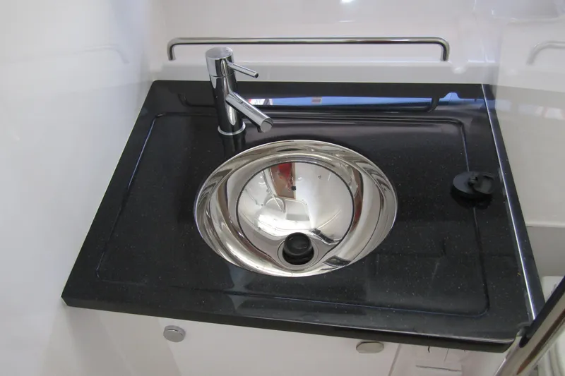  Yacht Photos Pics Stainless steel sink with modern faucet in 2025 Nimbus Commuter 11 boat.