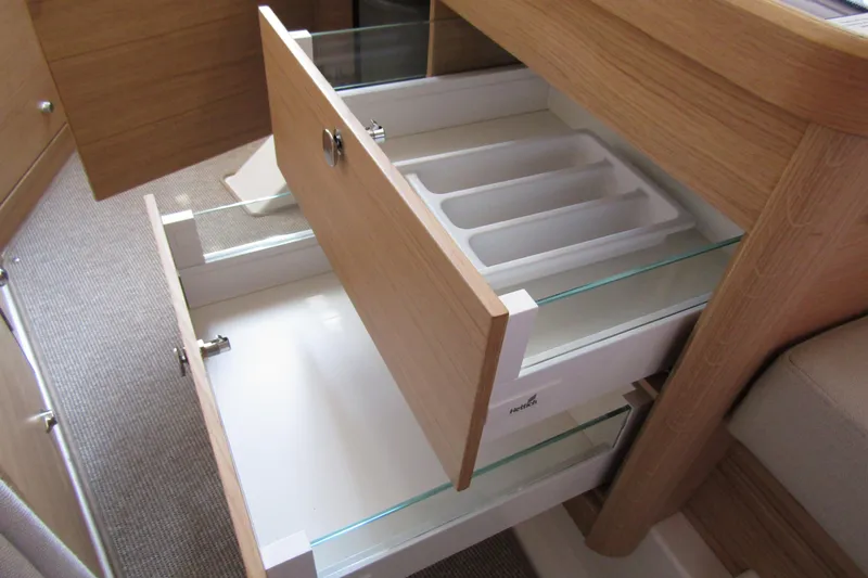  Yacht Photos Pics Open wooden drawers with glass sides in Nimbus Commuter 11, 2025 model.