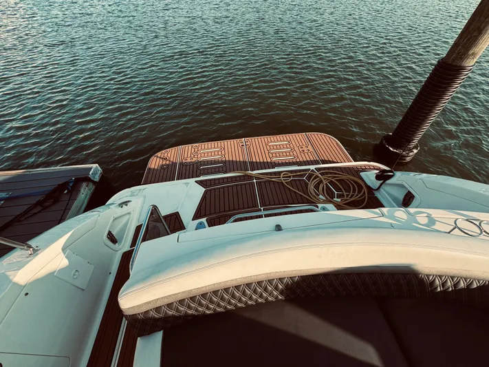 Oasis Yacht Photos Pics 2008 Sea Ray 350 Sundancer at dock, view of swim platform and water.