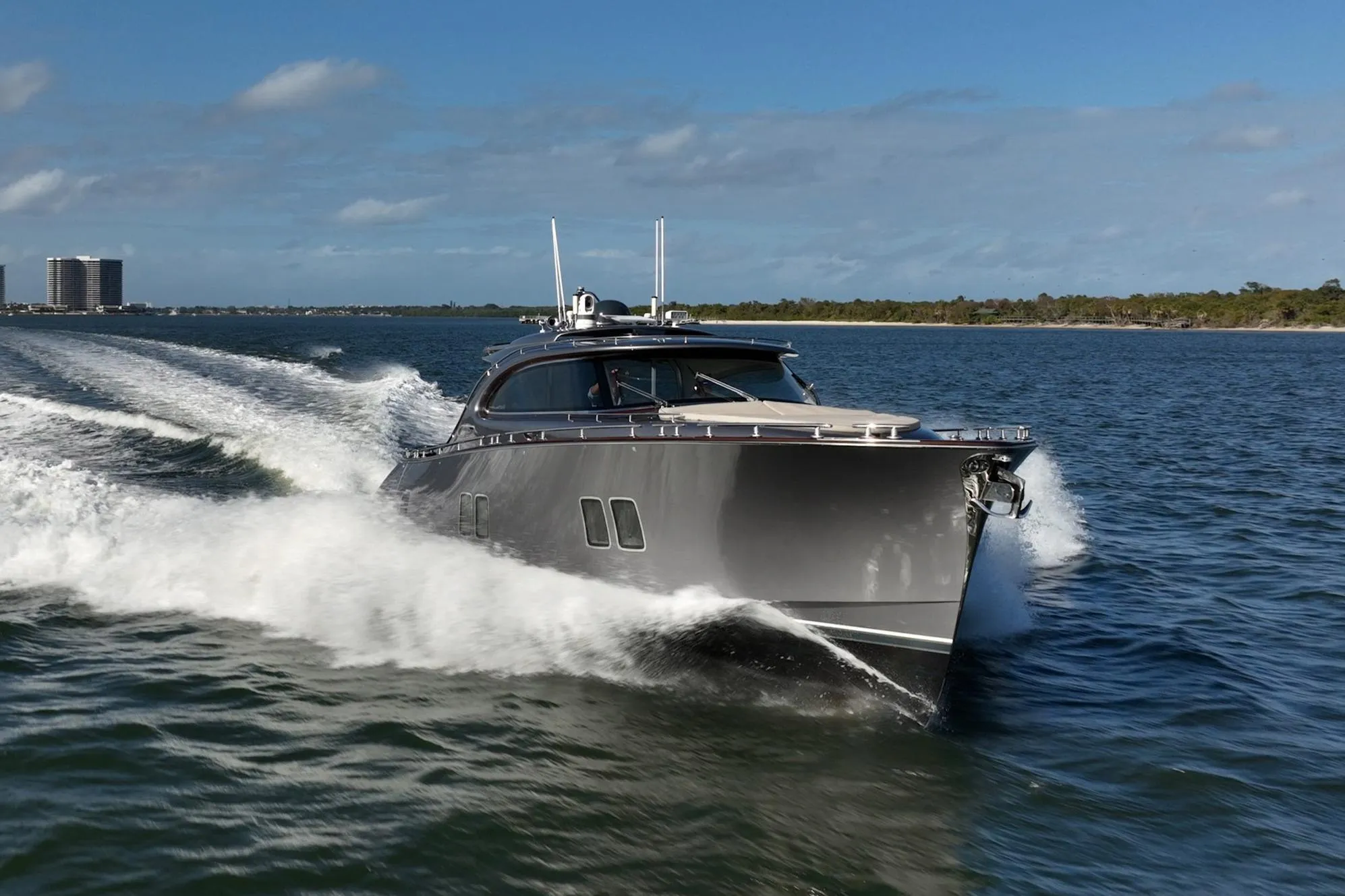 2025 Zeelander Z5 yacht cruising on open water under clear blue skies.