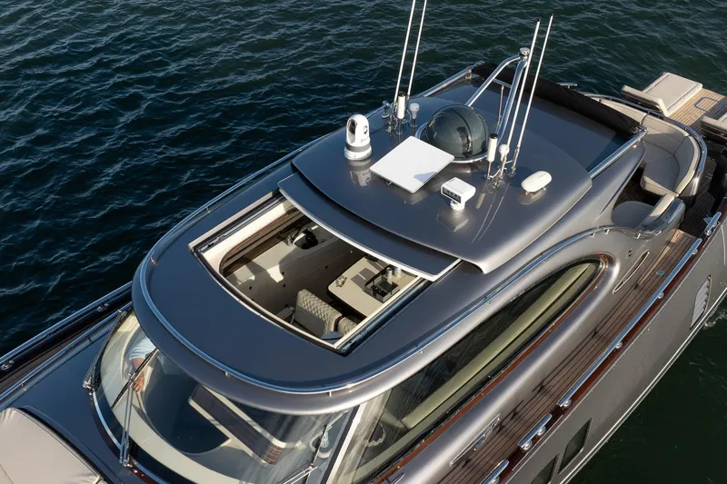 Hope Yacht Photos Pics 2025 Zeelander Z5 yacht with sleek design and open sunroof on calm water.