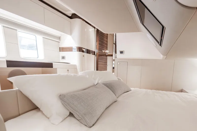Hope Yacht Photos Pics Luxurious interior cabin of 2025 Zeelander Z5 yacht with elegant bedding and modern design.