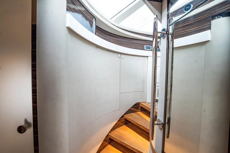 Hope Yacht Photos Pics Luxurious interior of 2025 Zeelander Z5 yacht with elegant wooden stairs and modern design.