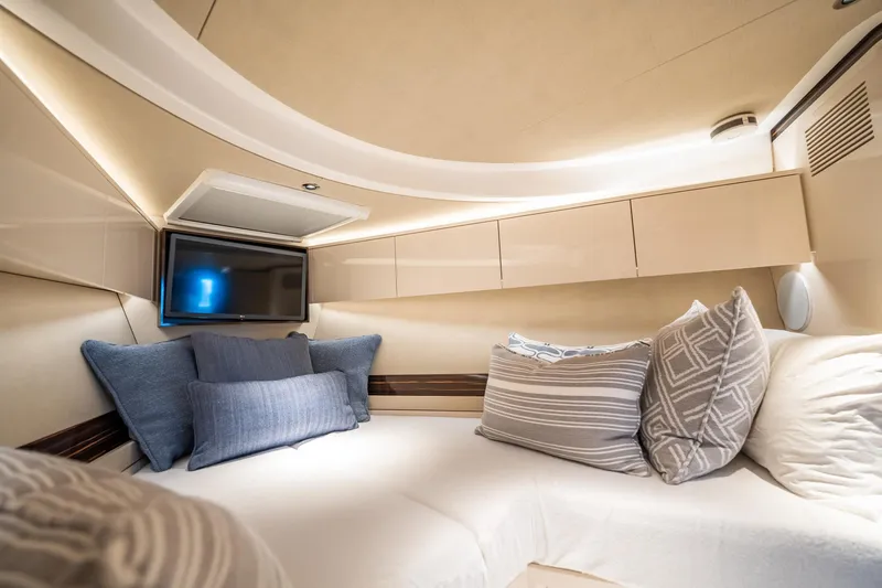 Hope Yacht Photos Pics Luxurious interior cabin of 2025 Zeelander Z5 yacht with cozy pillows and TV.