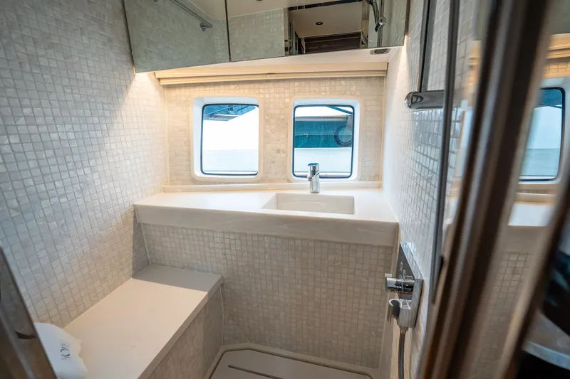 Hope Yacht Photos Pics Luxurious bathroom interior of 2025 Zeelander Z5 yacht with modern fixtures and mosaic tiles.