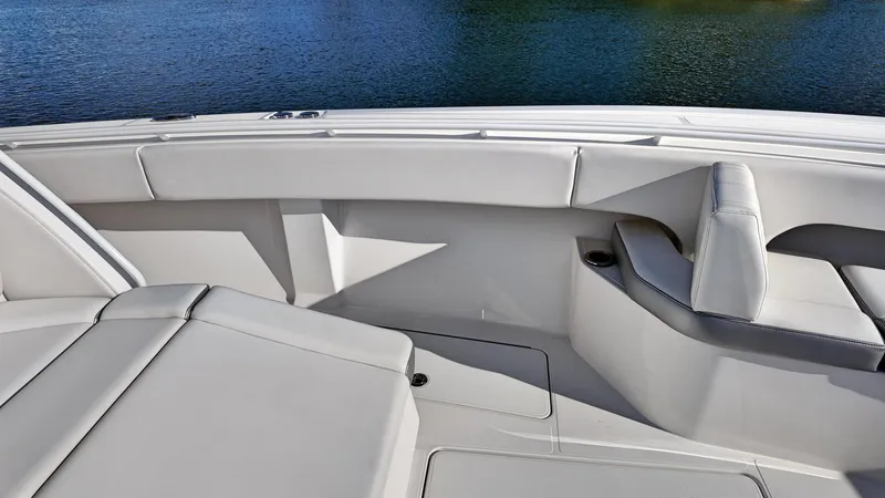  Yacht Photos Pics 2022 Fountain 38TE boat interior with white seating and water view.