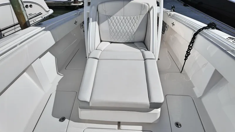  Yacht Photos Pics Luxurious seating on 2022 Fountain 38TE boat, featuring sleek white upholstery.