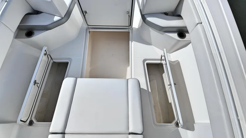  Yacht Photos Pics Interior view of 2022 Fountain 38TE boat with open storage compartments.
