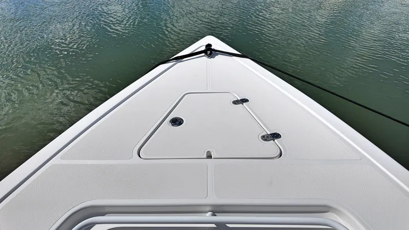  Yacht Photos Pics Bow of 2022 Fountain 38TE boat on calm water.