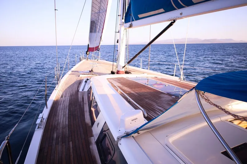 Ayacucho Yacht Photos Pics Sailing on a 2008 Hanse 630E yacht with wooden deck and blue sails.