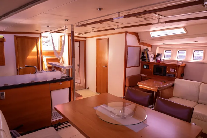 Ayacucho Yacht Photos Pics Luxurious interior of 2008 Hanse 630E yacht with modern kitchen and dining area.