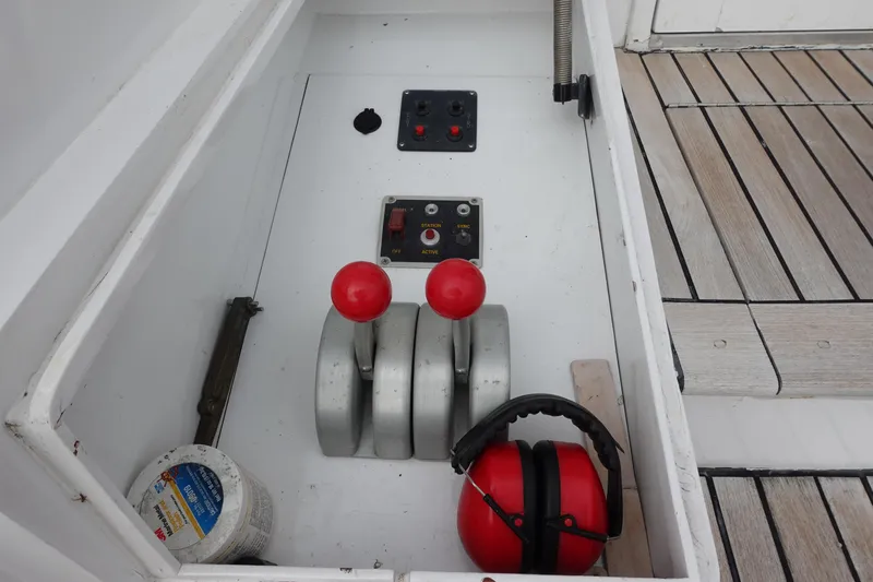  Yacht Photos Pics Control panel of 1988 Donzi Z-65 Tournament Fisherman with throttle levers and safety gear.