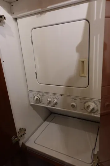  Yacht Photos Pics Stacked washer and dryer unit inside 1988 Donzi Z-65 Tournament Fisherman boat.