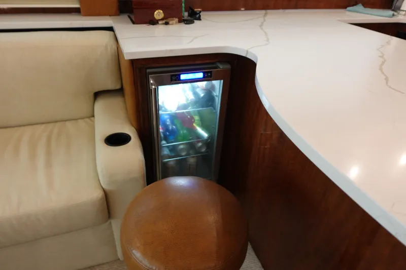  Yacht Photos Pics Interior of 1988 Donzi Z-65 Tournament Fisherman with mini fridge and seating area.