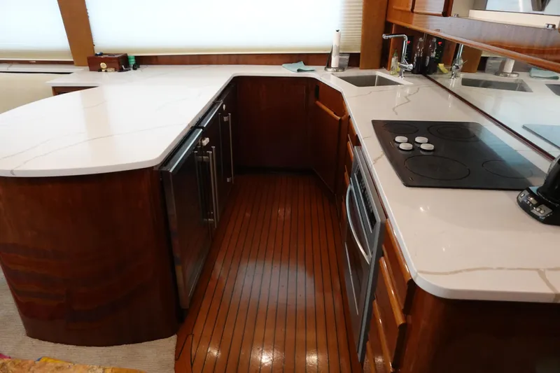  Yacht Photos Pics Luxurious kitchen interior of 1988 Donzi Z-65 Tournament Fisherman yacht with modern appliances.