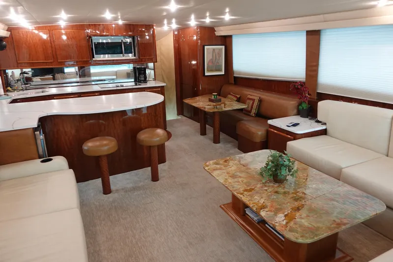  Yacht Photos Pics Luxurious interior of 1988 Donzi Z-65 Tournament Fisherman yacht with modern kitchen and seating area.