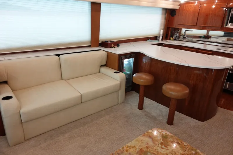  Yacht Photos Pics Luxurious interior of 1988 Donzi Z-65 Tournament Fisherman with sofa and kitchen bar.