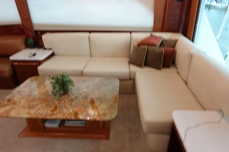  Yacht Photos Pics Luxurious interior of 1988 Donzi Z-65 Tournament Fisherman yacht with elegant seating and marble table.