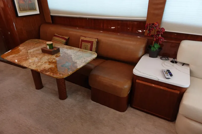  Yacht Photos Pics Luxurious interior of 1988 Donzi Z-65 Tournament Fisherman with leather seating and elegant table.