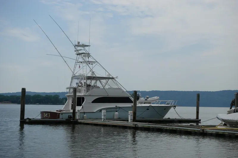  Yacht Photos Pics 1988 Donzi Z-65 Tournament Fisherman yacht docked at a marina, calm water, overcast sky.