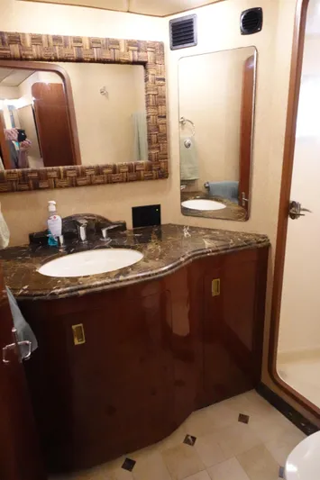  Yacht Photos Pics Luxurious bathroom in 1988 Donzi Z-65 Tournament Fisherman yacht with marble countertop.