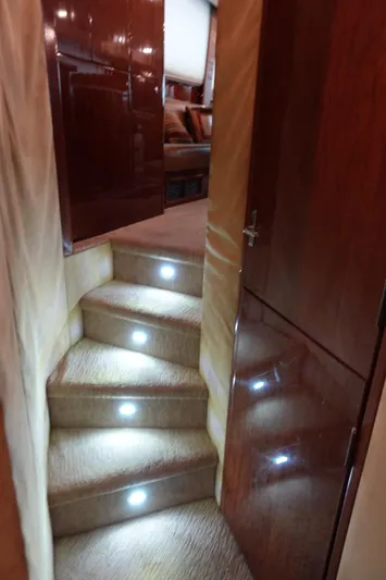  Yacht Photos Pics Interior of 1988 Donzi Z-65 Tournament Fisherman with illuminated carpeted stairs.