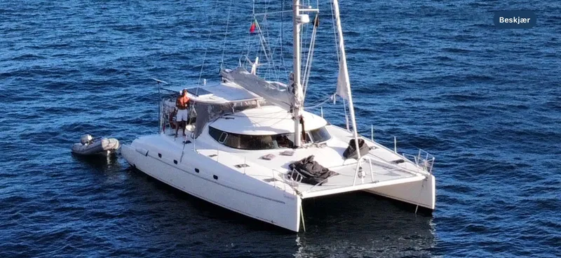 Savannah Yacht Photos Pics Fountaine Pajot Bahia 46 catamaran from 1998 sailing on calm blue waters.