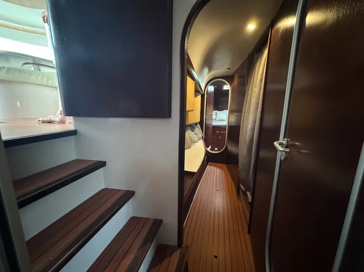 Savannah Yacht Photos Pics Interior of 1998 Fountaine Pajot Bahia 46 catamaran with wooden flooring and cozy cabin.