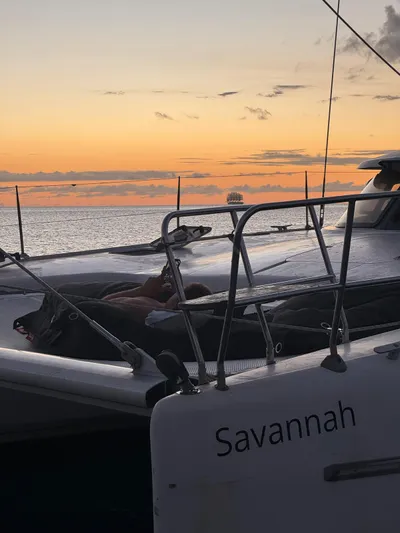 Savannah Yacht Photos Pics Fountaine Pajot Bahia 46 catamaran at sunset, 1998 model, ocean view.