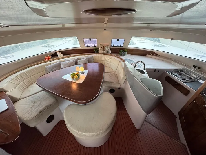 Savannah Yacht Photos Pics Interior of 1998 Fountaine Pajot Bahia 46 catamaran with elegant seating and dining area.