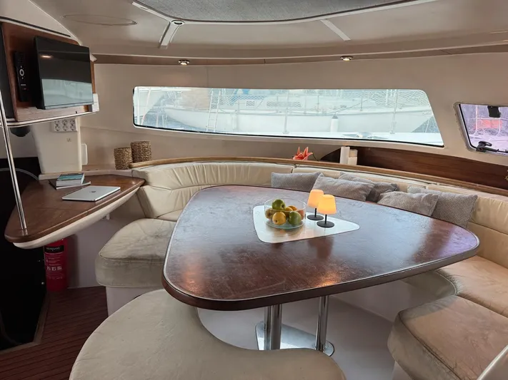 Savannah Yacht Photos Pics Luxurious interior of 1998 Fountaine Pajot Bahia 46 catamaran with elegant dining area.