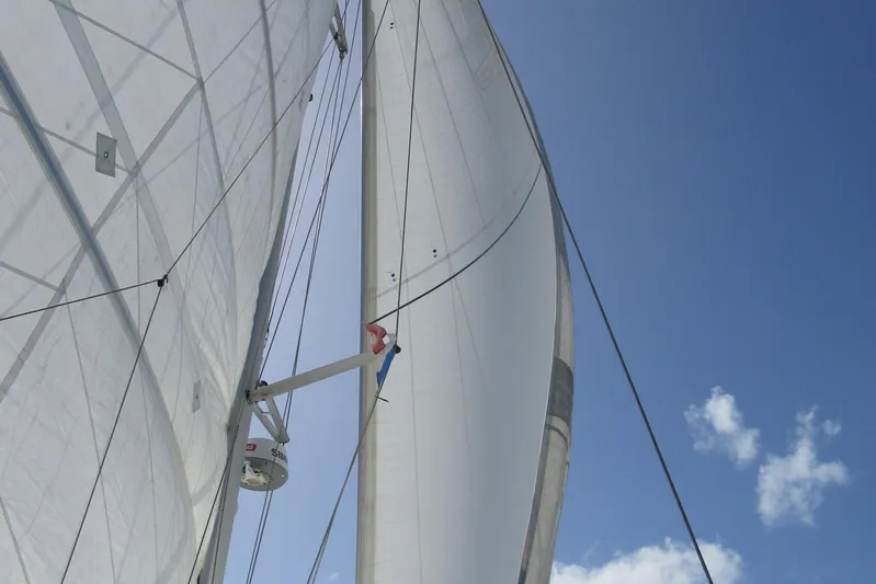 Savannah Yacht Photos Pics Sails of a 1998 Fountaine Pajot Bahia 46 catamaran against a clear blue sky.