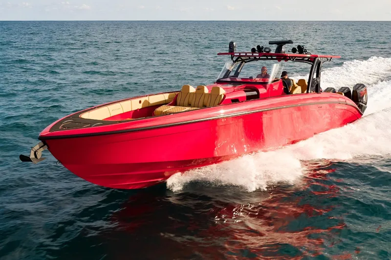  Yacht Photos Pics 2024 Midnight Express 43' Solstice speedboat cruising on open water.