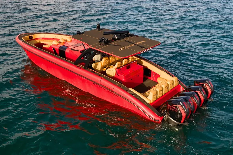  Yacht Photos Pics 2024 Midnight Express 43' Solstice boat with red and tan design on open water.