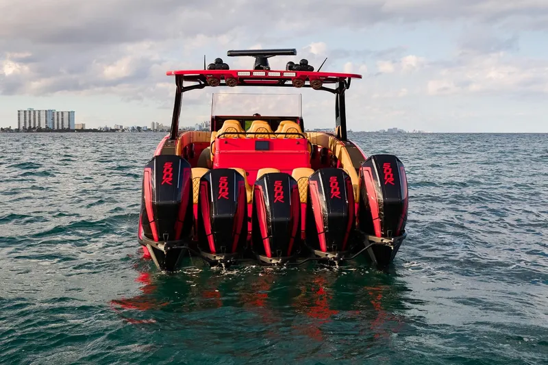  Yacht Photos Pics 2024 Midnight Express 43' Solstice boat with five powerful engines on open water.