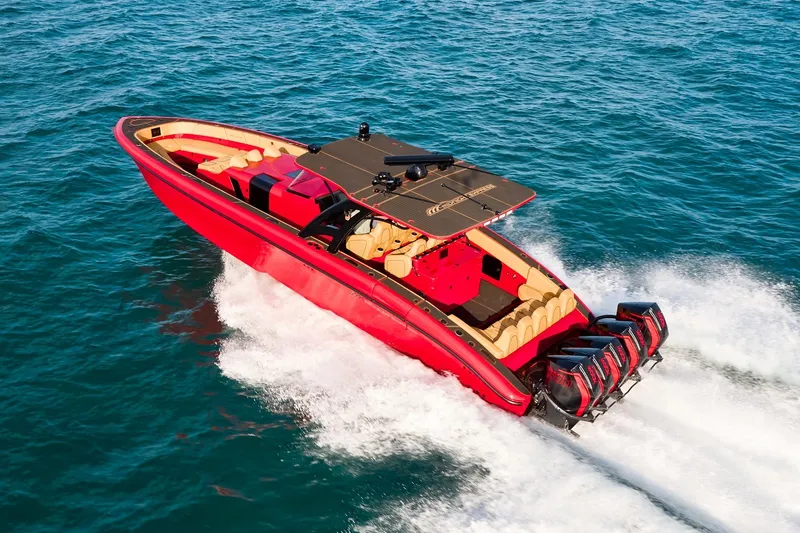  Yacht Photos Pics 2024 Midnight Express 43' Solstice speedboat cruising on open water.