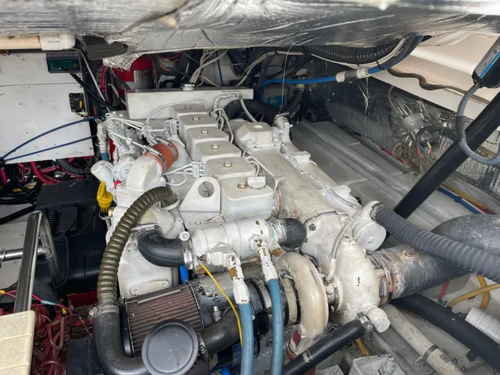  Yacht Photos Pics Engine compartment of a 2003 Tiara Yachts 3500 Open, showcasing detailed mechanical components.