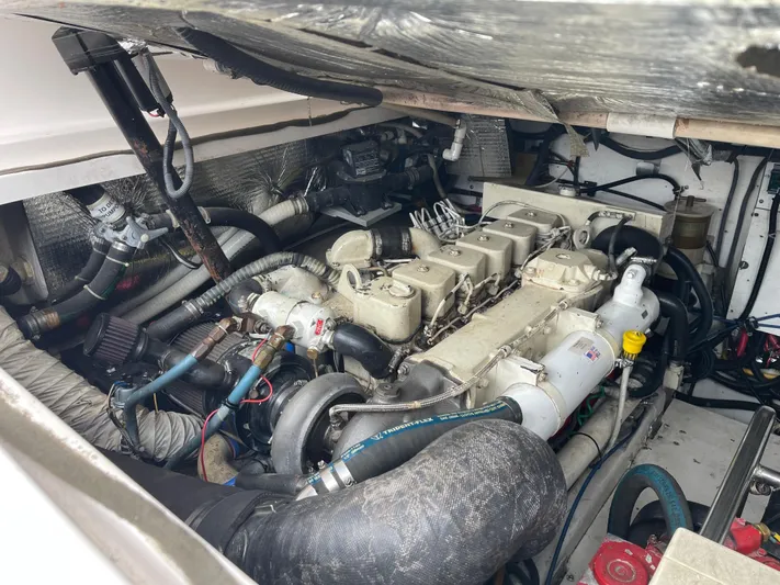  Yacht Photos Pics Engine compartment of a 2003 Tiara Yachts 3500 Open, showcasing detailed mechanical components.