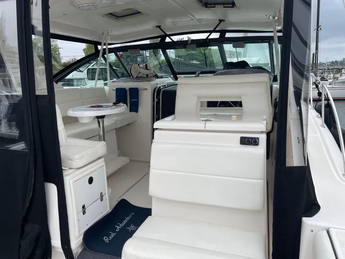  Yacht Photos Pics 2003 Tiara Yachts 3500 Open interior with white seating and helm station.