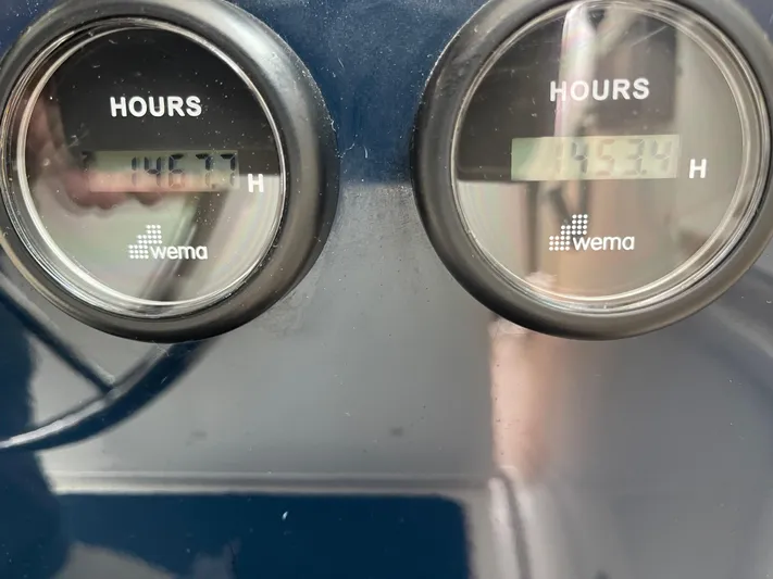  Yacht Photos Pics Hour meters on a 2003 Tiara Yachts 3500 Open, displaying 1467.7 and 1534 hours.