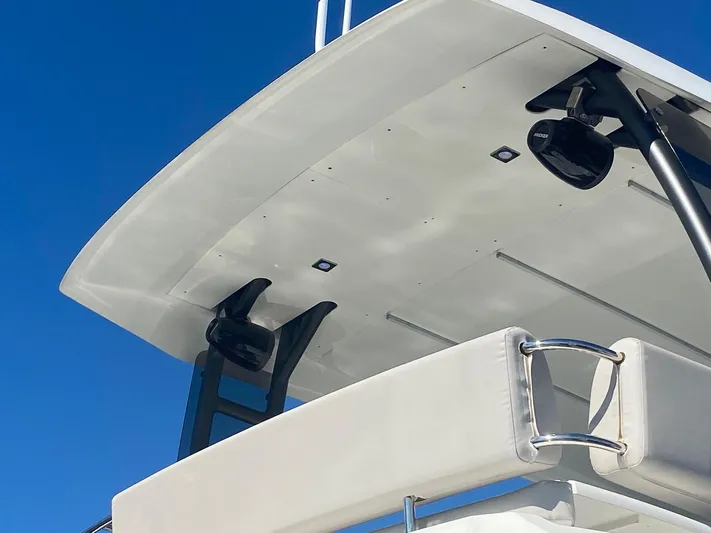  Yacht Photos Pics Flybridge of 2020 Prestige 420 yacht against clear blue sky.