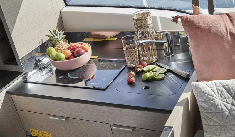  Yacht Photos Pics Modern kitchen in 2020 Prestige 420 yacht with fruit bowl and sleek design.