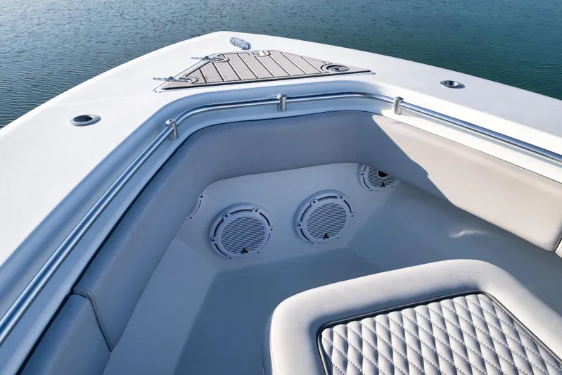  Yacht Photos Pics 2021 Contender 39 ST boat interior with speakers and cushioned seating.