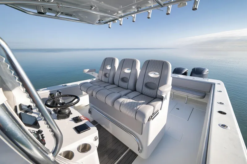  Yacht Photos Pics 2021 Contender 39 ST boat interior with luxurious seating and ocean view.
