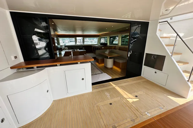  Yacht Photos Pics Luxurious interior of 2022 ILIAD 50 yacht with modern design and spacious seating area.