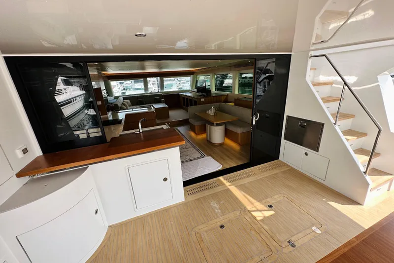  Yacht Photos Pics Luxurious interior of 2022 ILIAD 50 yacht with modern design and spacious seating area.