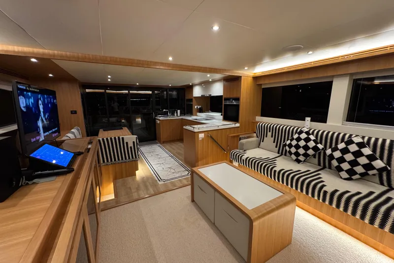  Yacht Photos Pics Luxurious interior of 2022 ILIAD 50 yacht with modern furnishings and ambient lighting.