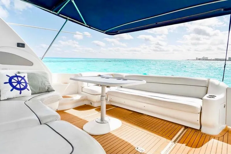 Nauti Nauti Yacht Photos Pics Luxurious 2000 Sea Ray 450 Express Bridge yacht with spacious deck and ocean view.