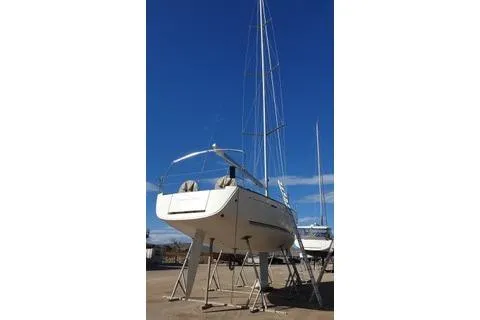  Yacht Photos Pics 2010 Dufour 45E Performance sailboat on stands, clear sky background.